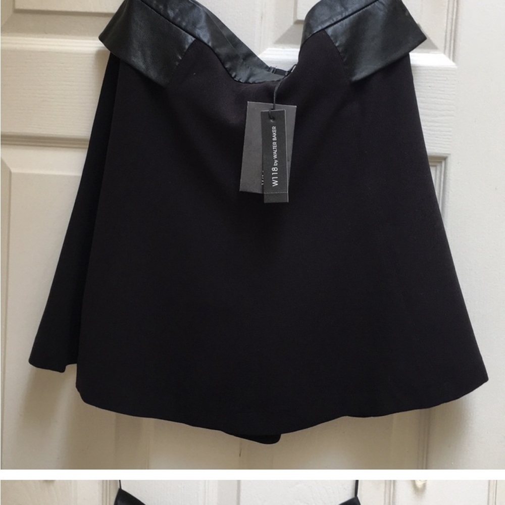 Adorable black skirt w/faux leather trim